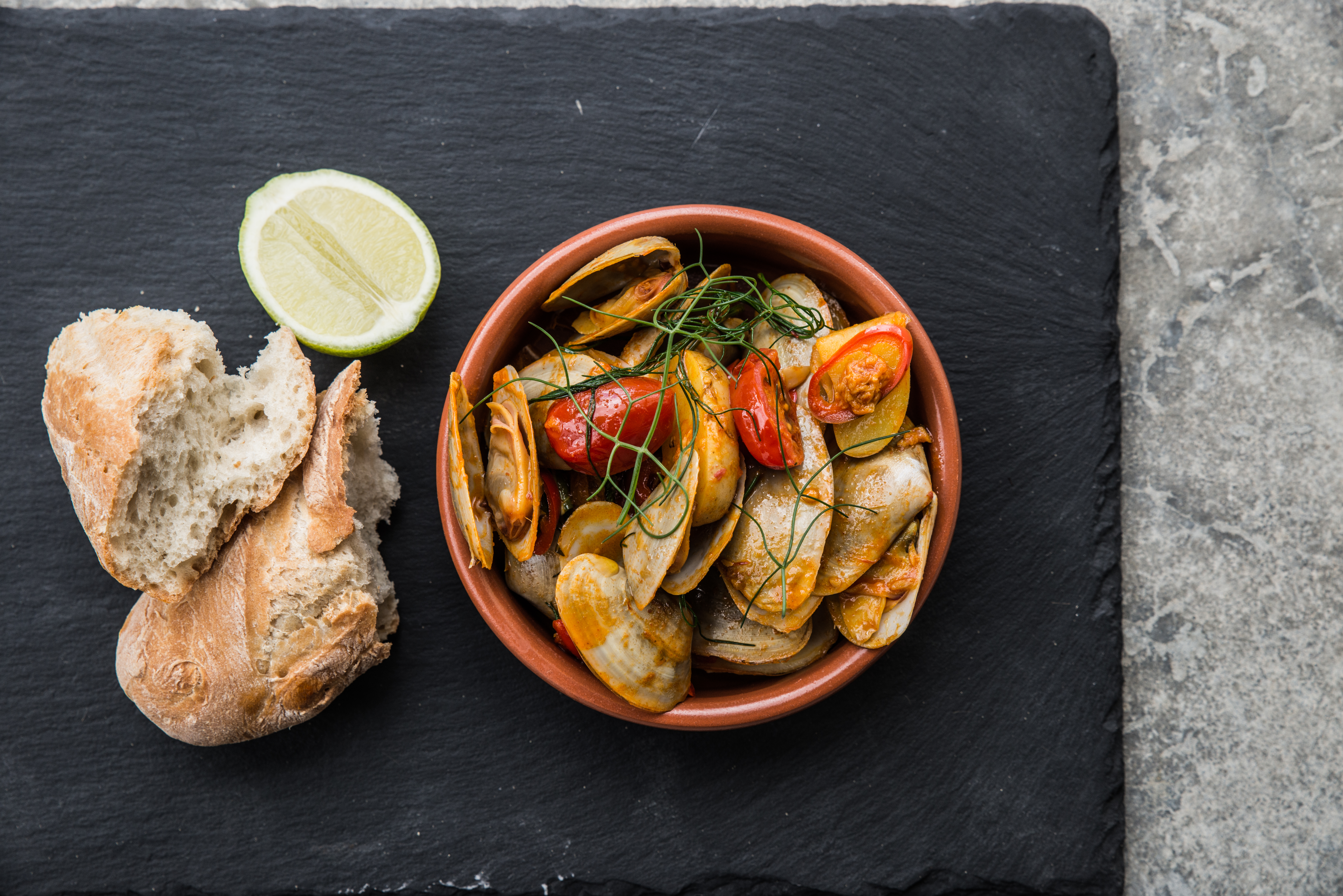 Tua Tua clams with smoked paprika, tomatoes and basil