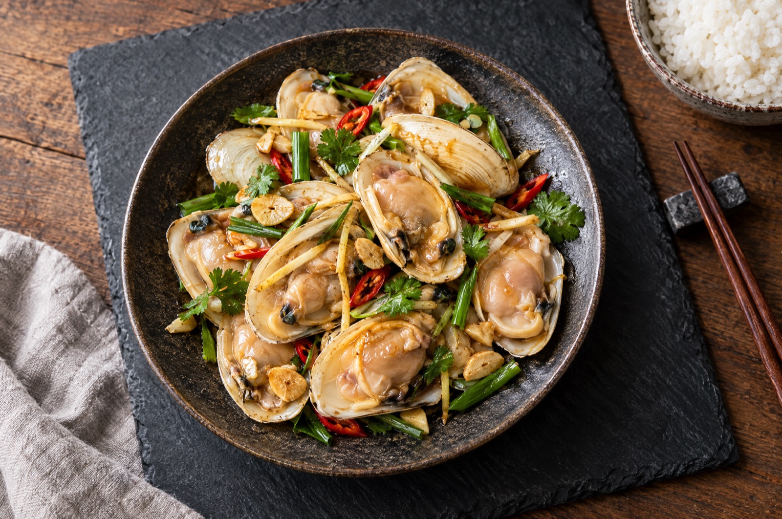 Stir fried Tua Tua clams with garlic and ginger